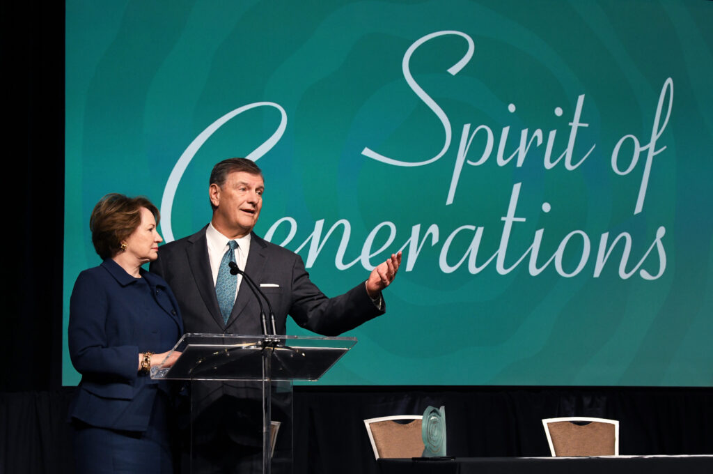 Micki & Mike Rawlings accept the Spirit of Generations Award on March 9, 2023.