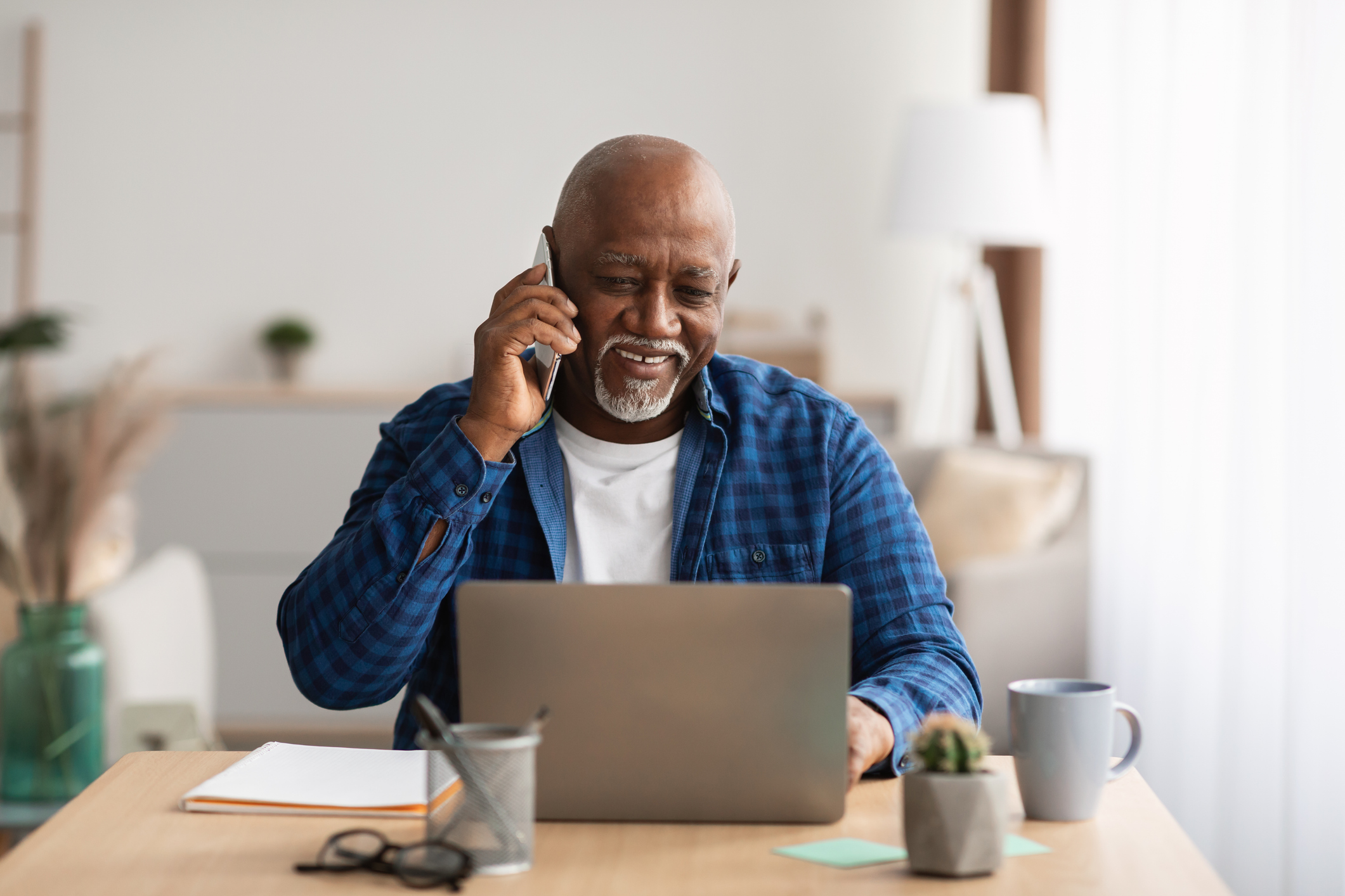 A caregiver assisting a senior individual with daily activities, providing support and companionship