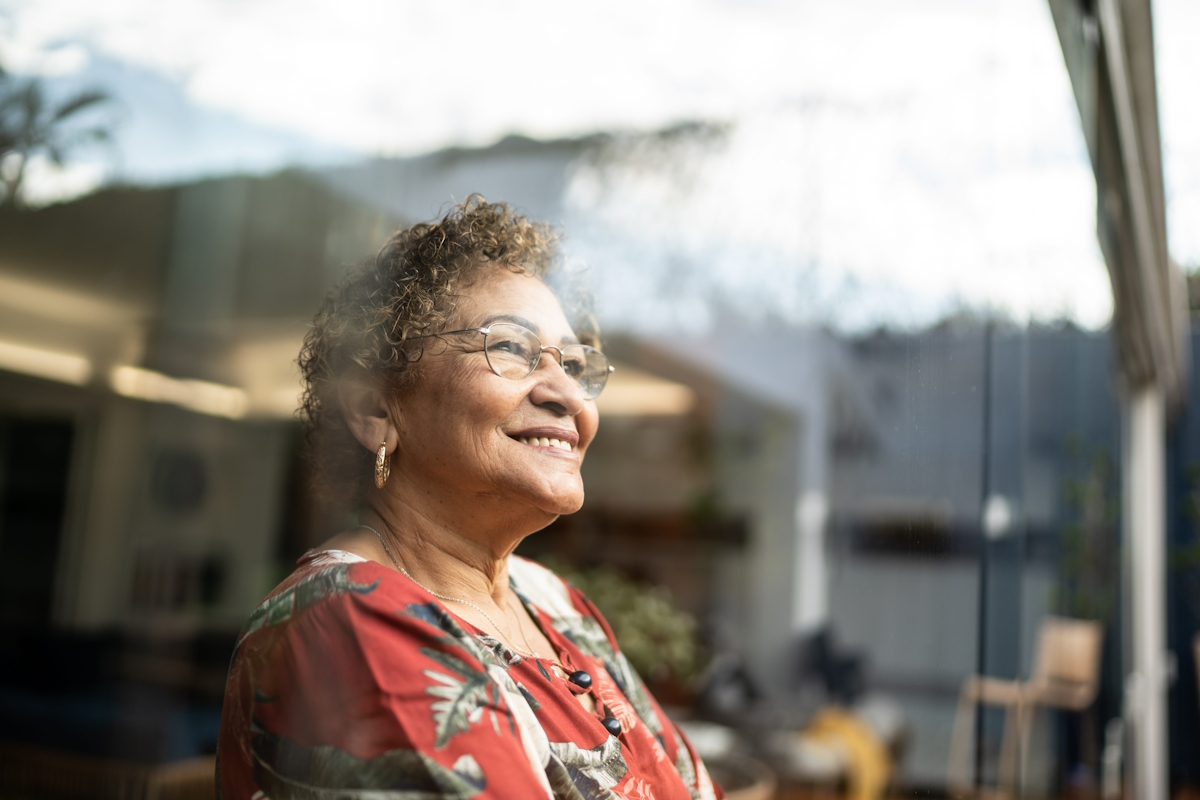 Texas state benefits senior woman contemplating at home